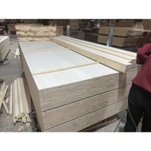 Stack of calibrated LVL packaging plywood panels ready for international logistics export.